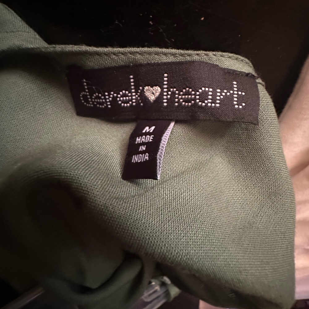 Green short romper size medium